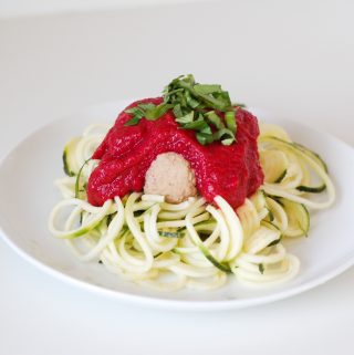 creamy tomato sauce on top of zucchini noodles